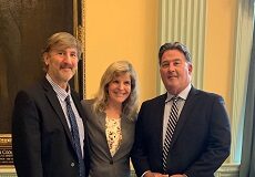 Senator Montigny (right) and Jim Jensvold and Dr. Jennifer Conrad of the Paw Project